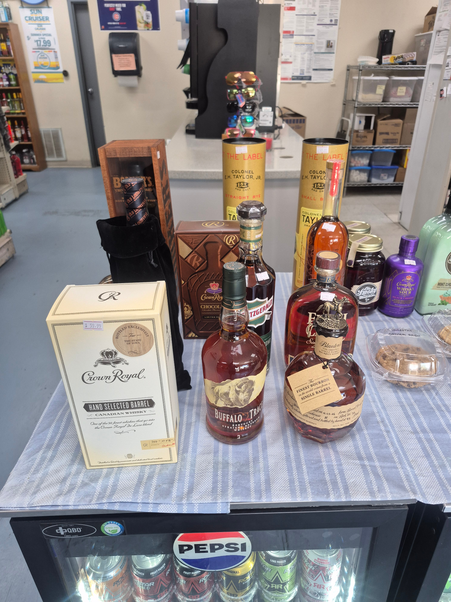 Premium bourbon selection: Crown Royal Hand Selected Barrel, Buffalo Trace, Blanton's, Eagle Rare, E.H. Taylor, Old Fitzgerald, Booker's